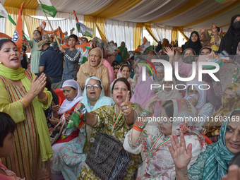 Supporters of the Indian National Congress attend a campaign rally held by Rahul Gandhi in Srinagar, Indian Administered Kashmir, on Septemb...