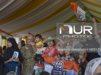 Supporters of the Indian National Congress attend a campaign rally held by Rahul Gandhi in Srinagar, Indian Administered Kashmir, on Septemb...