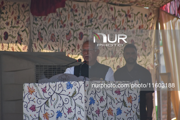 Indian National Congress candidate Tariq Karra addresses people during a campaign rally in Srinagar, Indian Administered Kashmir, on Septemb...