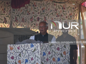 Indian National Congress candidate Tariq Karra addresses people during a campaign rally in Srinagar, Indian Administered Kashmir, on Septemb...