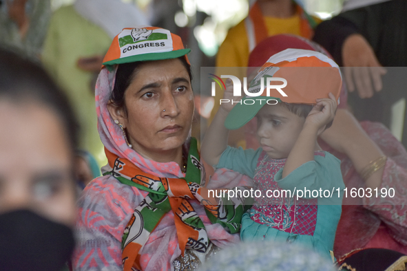 Supporters of the Indian National Congress attend a campaign rally held by Rahul Gandhi in Srinagar, Indian Administered Kashmir, on Septemb...