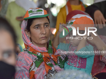 Supporters of the Indian National Congress attend a campaign rally held by Rahul Gandhi in Srinagar, Indian Administered Kashmir, on Septemb...