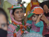 Supporters of the Indian National Congress attend a campaign rally held by Rahul Gandhi in Srinagar, Indian Administered Kashmir, on Septemb...