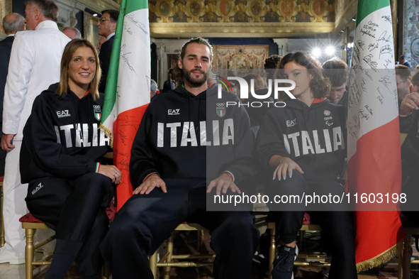 (Left to right) Arianna Arrigo, Gianmarco Tamberi, and Ambra Sabatini during the return ceremony of the flag of the Italian athletes returni...