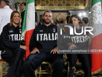 (Left to right) Arianna Arrigo, Gianmarco Tamberi, and Ambra Sabatini during the return ceremony of the flag of the Italian athletes returni...