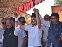 Indian National Congress members stand during a rally held by Rahul Gandhi in Srinagar, Indian Administered Kashmir, on September 23, 2024....