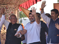 Indian National Congress members stand during a rally held by Rahul Gandhi in Srinagar, Indian Administered Kashmir, on September 23, 2024....