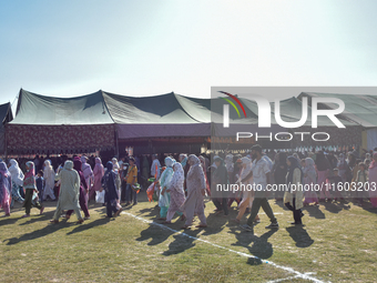 Supporters of the Indian National Congress leave the venue after a rally held by Rahul Gandhi in Srinagar, Indian Administered Kashmir, on S...