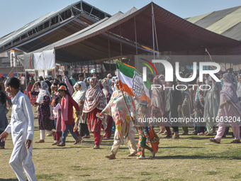 Supporters of the Indian National Congress leave the venue after a rally held by Rahul Gandhi in Srinagar, Indian Administered Kashmir, on S...