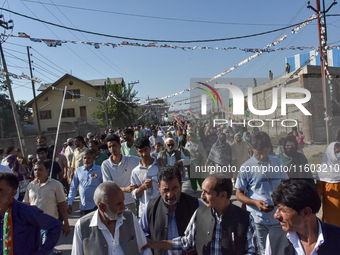 Supporters of the Indian National Congress leave the venue after a rally held by Rahul Gandhi in Srinagar, Indian Administered Kashmir, on S...