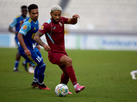 Marcelo Dias (front) of Gzira United is in action during the Malta 360 Sports Premier League soccer match between Gzira United and Sliema Wa...