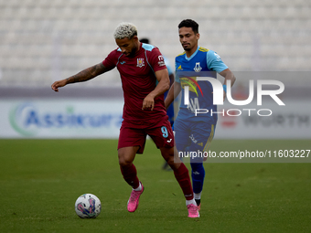 Marcelo Dias (front) of Gzira United is in action during the Malta 360 Sports Premier League soccer match between Gzira United and Sliema Wa...