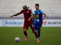 Marcelo Dias (front) of Gzira United is in action during the Malta 360 Sports Premier League soccer match between Gzira United and Sliema Wa...