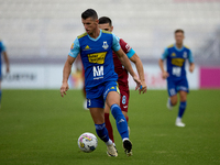 Vito Plut (front) of Sliema Wanderers is in action during the Malta 360 Sports Premier League soccer match between Gzira United and Sliema W...