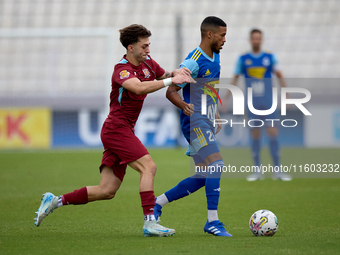 Wescley Matos Da Silva (R) of Sliema Wanderers moves with the ball ahead of Brooklyn Borg (L) of Gzira United during the Malta 360 Sports Pr...