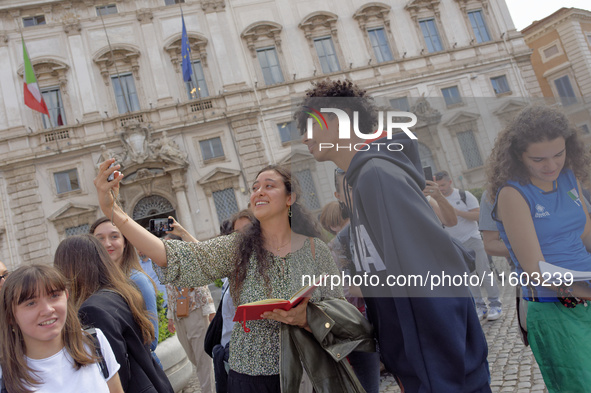 Mattia Furlani poses for a selfie at the end of the ceremony of the flags with the President of the Republic Sergio Mattarella in Rome, Ital...