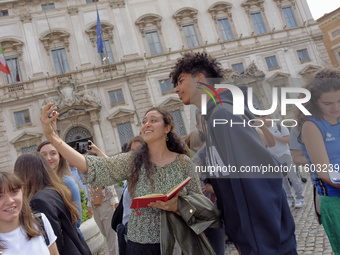 Mattia Furlani poses for a selfie at the end of the ceremony of the flags with the President of the Republic Sergio Mattarella in Rome, Ital...