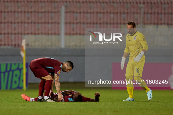 Douglas De Santana of Gzira United lies injured on the pitch during the Malta 360 Sports Premier League soccer match between Gzira United an...