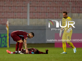 Douglas De Santana of Gzira United lies injured on the pitch during the Malta 360 Sports Premier League soccer match between Gzira United an...