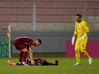 Douglas De Santana of Gzira United lies injured on the pitch during the Malta 360 Sports Premier League soccer match between Gzira United an...