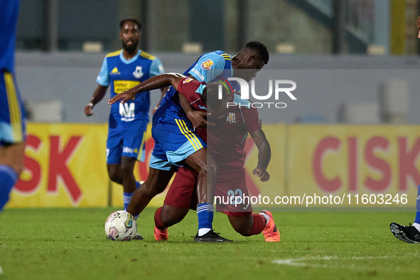 Douglas De Santana (R) of Gzira United competes for the ball with Simon Zibo (L) of Sliema Wanderers during the Malta 360 Sports Premier Lea...