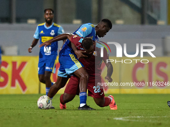 Douglas De Santana (R) of Gzira United competes for the ball with Simon Zibo (L) of Sliema Wanderers during the Malta 360 Sports Premier Lea...