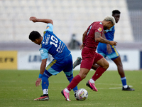 In Ta' Qali, Malta, on September 21, 2024, Samuel Gomes Da Mata (L) of Sliema Wanderers competes for the ball with Marcelo Dias (R) of Gzira...