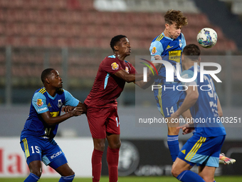 Nicholas Strickland (top 2nd right) heads the ball during the Malta 360 Sports Premier League soccer match between Gzira United and Sliema W...