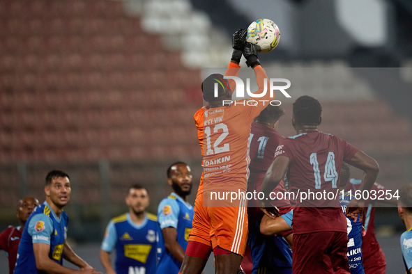 Emeka Kelvin Agu, goalkeeper of Sliema Wanderers, punches the ball during the Malta 360 Sports Premier League soccer match between Gzira Uni...