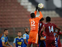 Emeka Kelvin Agu, goalkeeper of Sliema Wanderers, punches the ball during the Malta 360 Sports Premier League soccer match between Gzira Uni...