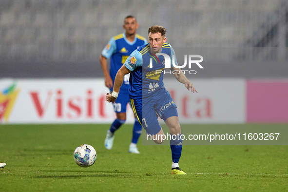 Adam Magri Overend of Sliema Wanderers is in action during the Malta 360 Sports Premier League soccer match between Gzira United and Sliema...