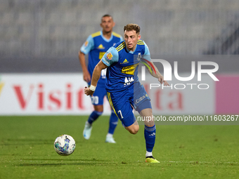 Adam Magri Overend of Sliema Wanderers is in action during the Malta 360 Sports Premier League soccer match between Gzira United and Sliema...