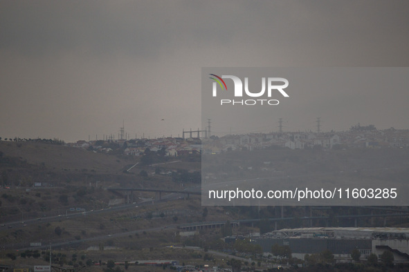 A general view of electric towers on a cloudy day due to smoke from wildfires in Lisbon, Portugal, on September 22, 2024. The fires that beg...