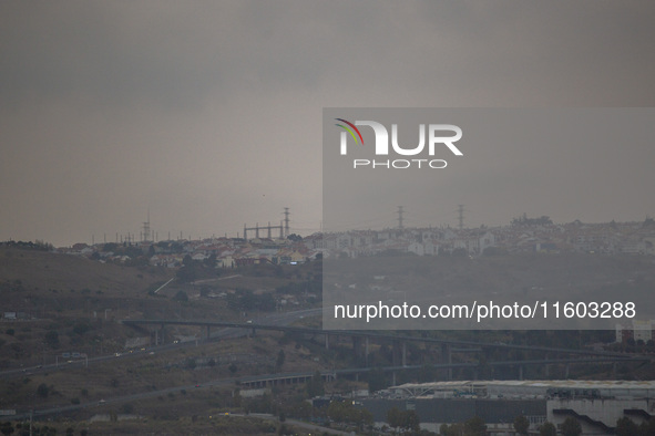 A general view of electric towers on a cloudy day due to smoke from wildfires in Lisbon, Portugal, on September 22, 2024. The fires that beg...