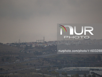 A general view of electric towers on a cloudy day due to smoke from wildfires in Lisbon, Portugal, on September 22, 2024. The fires that beg...