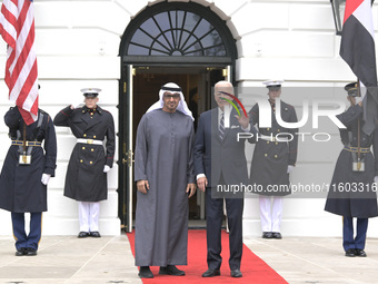 US President Joe Biden greets His Highness President Sheikh Mohamed bin Zayed Al Nahyan of the United Arab Emirates on the South Lawn of the...