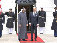 US President Joe Biden greets His Highness President Sheikh Mohamed bin Zayed Al Nahyan of the United Arab Emirates on the South Lawn of the...