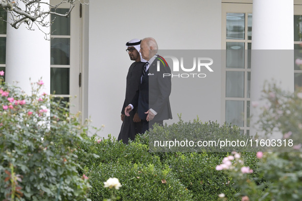 US President Joe Biden greets His Highness President Sheikh Mohamed bin Zayed Al Nahyan of the United Arab Emirates on the South Lawn of the...