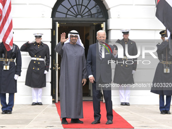 US President Joe Biden greets His Highness President Sheikh Mohamed bin Zayed Al Nahyan of the United Arab Emirates on the South Lawn of the...