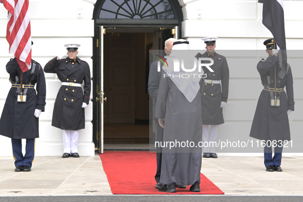 US President Joe Biden greets His Highness President Sheikh Mohamed bin Zayed Al Nahyan of the United Arab Emirates on the South Lawn of the...