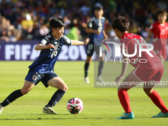 Miyu Matsunaga of Japan and Shinomi Koyama of Korea DPR fight for the ball during the FIFA U-20 Women's World Cup Colombia 2024 final match...