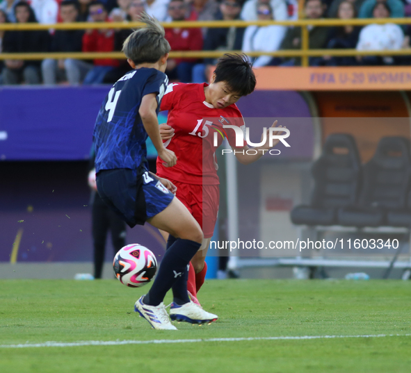 Shinomi Koyama of Japan and Il-Son Choe of Korea DPR fight for the ball during the FIFA U-20 Women's World Cup Colombia 2024 final match bet...