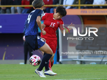 Shinomi Koyama of Japan and Il-Son Choe of Korea DPR fight for the ball during the FIFA U-20 Women's World Cup Colombia 2024 final match bet...