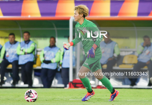 Akane Okuma of Japan controls the ball during the FIFA U-20 Women's World Cup final match between Korea DPR and Japan at El Campin Stadium i...