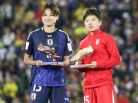 Maya Hijikata of Japan poses with Choe Il Son of Korea DPR with the Adidas Bronze Boot and Adidas Golden Boot awards after the FIFA U-20 Wom...