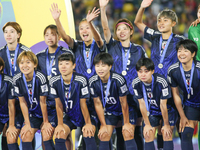 Players of Japan pose for a team photo with the second place medals after the FIFA U-20 Women's World Cup Colombia 2024 Final match between...