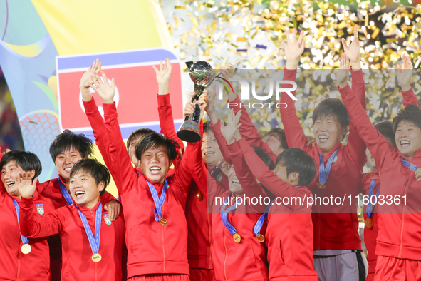 Players of Korea DPR celebrate after winning the FIFA U-20 Women's World Cup Colombia 2024 Final match between Korea DPR and Japan at Estadi...