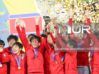 Players of Korea DPR celebrate after winning the FIFA U-20 Women's World Cup Colombia 2024 Final match between Korea DPR and Japan at Estadi...