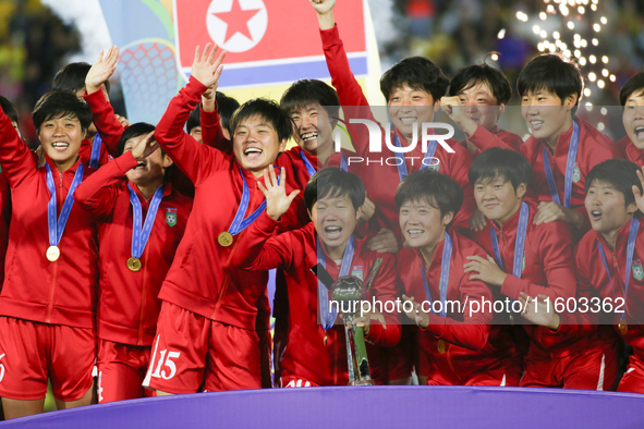 Players of Korea DPR celebrate after winning the FIFA U-20 Women's World Cup Colombia 2024 Final match between Korea DPR and Japan at Estadi...