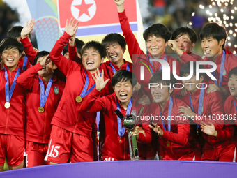 Players of Korea DPR celebrate after winning the FIFA U-20 Women's World Cup Colombia 2024 Final match between Korea DPR and Japan at Estadi...